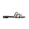 Sandalias planas de mujer tipo pala en color blanco y negro de la marca Bibi Lou