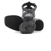 Sandalias planas negras de mujer con tachuelas y detalles plateados Bibi Lou